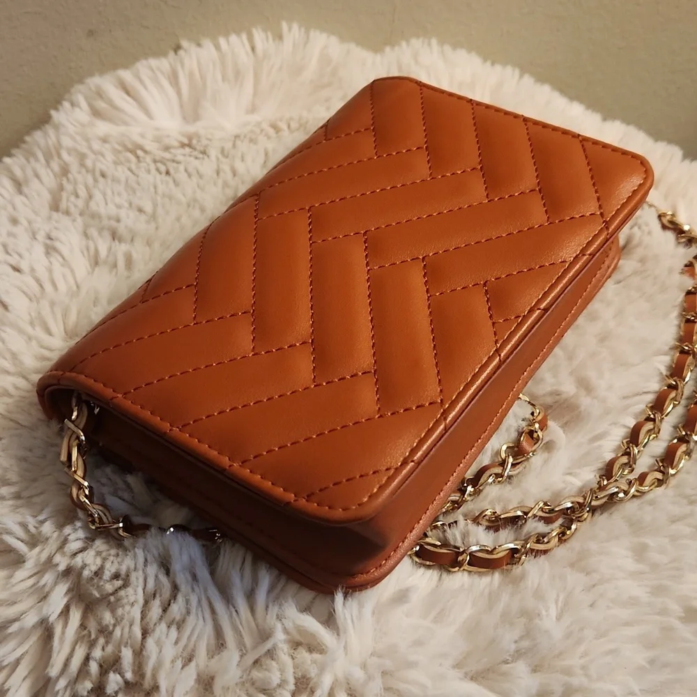 Bebe quilted bag with Gold rope chain cross body bag. Gently Used - Picture 6 of 16